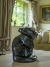 Seated Otter by Michael Cooper